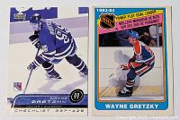 Fronts of both Gretzky cards showing player images and card fronts