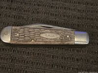 Closed Case pocket knife, jigged handle, bolsters