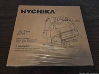 Front of sealed Hychika jig saw box showing brand, model and illustration