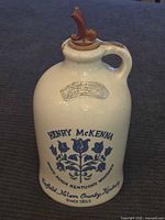 Full view of Henry McKenna ceramic jug showing overall form and stopper