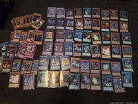 Wide view of full assortment laid out, showing quantity and mix of card types