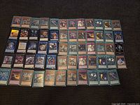 Overview grid of entire card lot displayed on floor