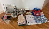 Full group shot of all bakeware, bowls, linens and accessories