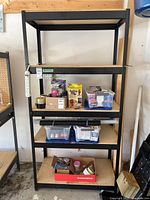 Front view of full shelving unit with five shelves