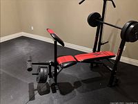 Weight bench with leg developer attachment