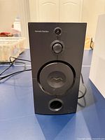 Front view showing driver cover, port, control knobs, overall condition