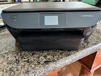 Front view of HP Envy 5640 printer closed