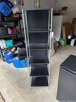 Front view of entire shelving unit showing six shelves