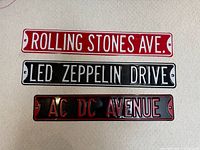Full view of all three band street signs