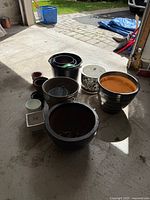 Group shot of all planters arranged in garage