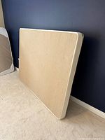 Front angled view of queen box spring