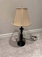 Full view of table lamp with shade and cord