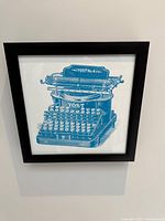 Front view of framed Yost No.4 typewriter print