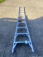 Ladder fully retracted on driveway