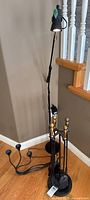 All three items together: fireplace tools, candelabra, floor lamp