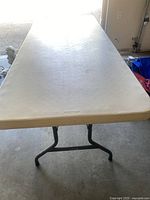 Top surface of folding table showing overall condition