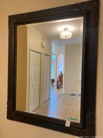 Front view of mirror showing full frame and glass