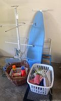 Overall lot with wire shelf, hockey gear drying rack, ironing board, baskets