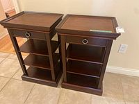 Front view of both matching wood side tables