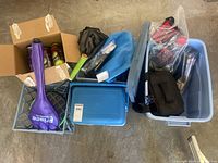 Grouped lot with Prince trainer, Penn ball tubes, plastic bins, cooler, accessories