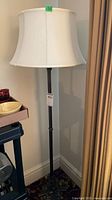 Full view of floor lamp with shade