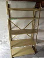 Full view of five-shelf metal utility rack