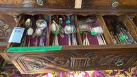 Drawer view showing majority of flatware pieces