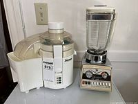 Both appliances side by side: Juiceman 211 juicer and Osterizer Cyclomatic 14 blender