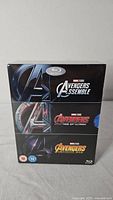 Front view of sealed Avengers Triple Pack Blu-ray showing film titles and age rating