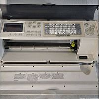 Cricut Expression keypad area with Straight From the Nest overlay and blade carriage