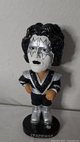 Front view of KISS Spaceman bobblehead on base