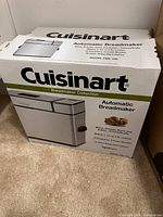 Factory box showing Cuisinart CBK-100 Automatic Breadmaker graphics