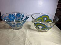 Both glass bowls side by side showing patterns and size