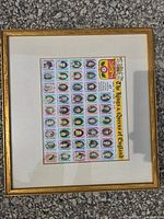 Front view of framed stamp sheet