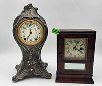 Front view of both mantel clocks together