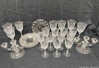 Full lot showing plates, goblets and candlesticks