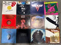 All 12 albums laid out in 3×4 grid