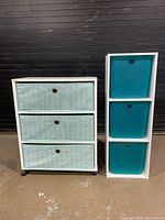 Front view of both storage units showing drawer fronts and bins