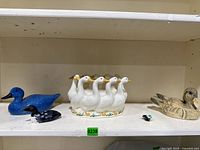 Shelf view showing all five duck items together