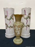 Group shot of all three vases showing size and designs