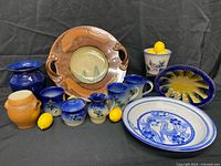 Group shot of all pottery items in lot