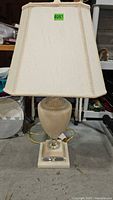 Full view of lamp with shade and base visible