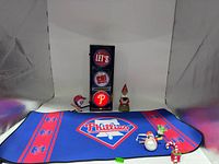 Full lot showing light, mouse pad, bobblehead and ornaments