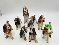 Group shot of nine dog figurines