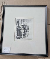 Full view of framed etching with frame visible
