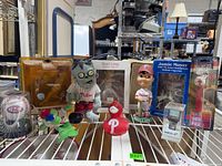 Shelf view showing all nine Phillies collectibles