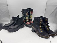 All three pairs of boots side by side