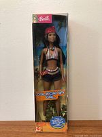 Front view of boxed California Girl Lea Barbie doll