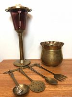 Group shot of lantern, pot and utensils