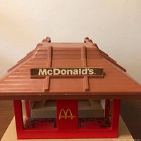 Front view showing roof and McDonald’s sign